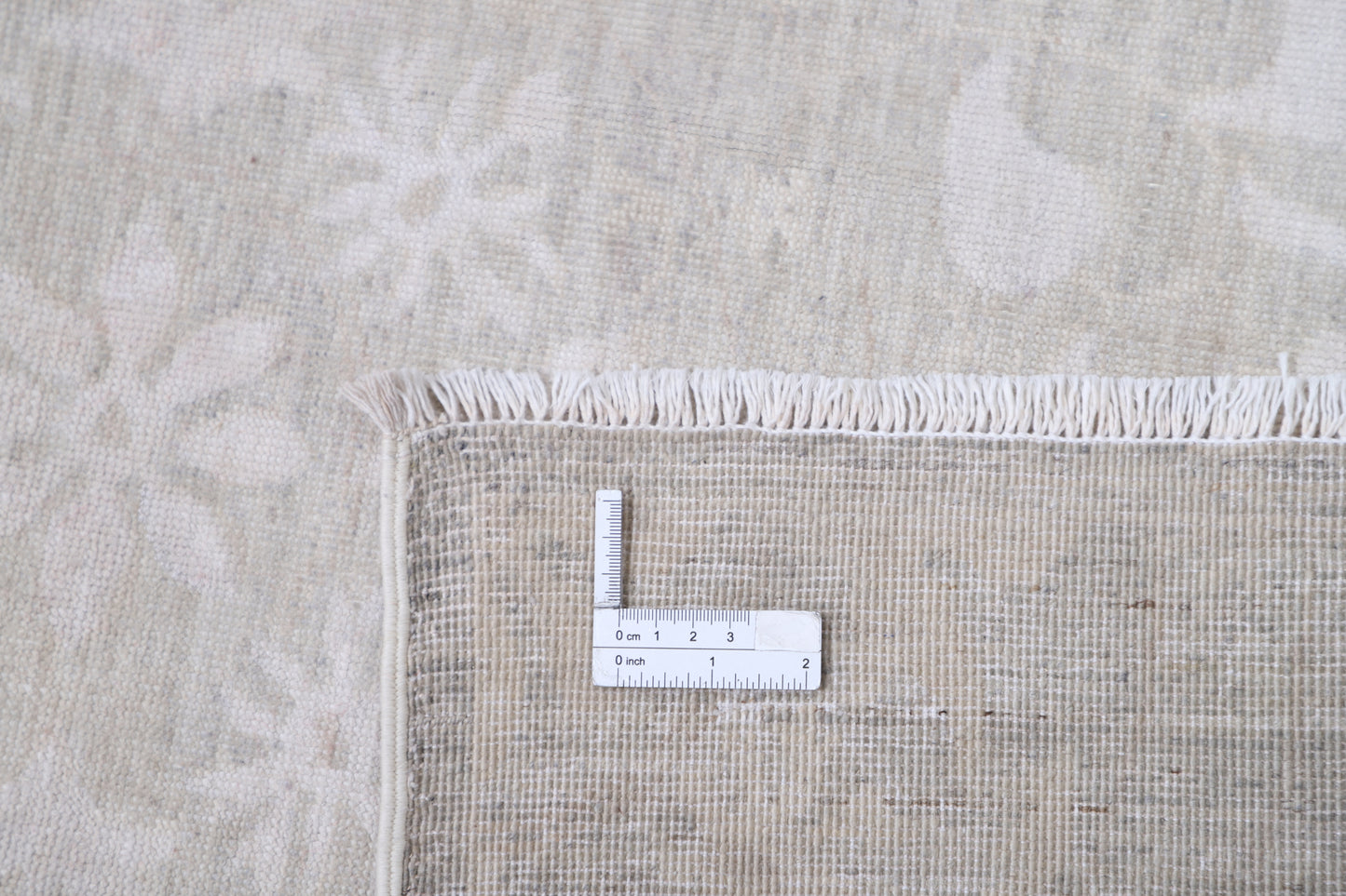 New Traditional Artemix hand-knotted wool rug (8′ 4″ × 11′ 7″), featuring a neutral-tone field with traditional motifs—crafted with rich texture and vintage-inspired design, available at Artemis Rugs in Carmel, California