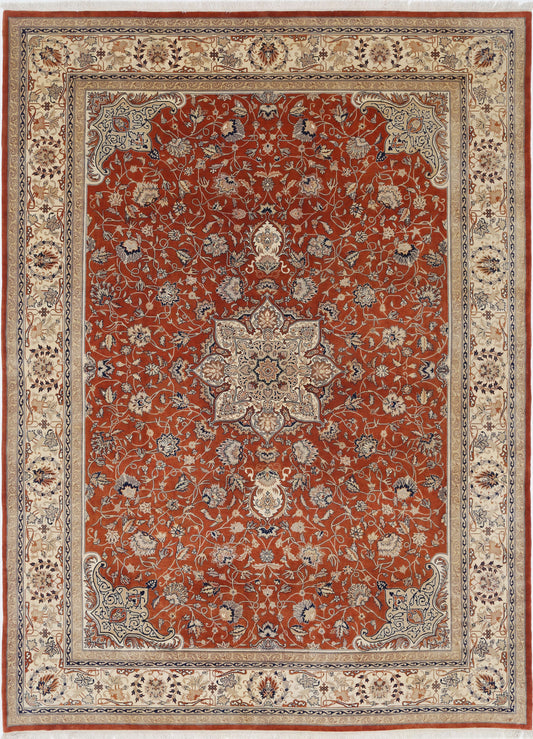 New Traditional Heritage hand-knotted wool rug measuring 10'2" x 13'10" (310 x 422 cm) in warm rust. This beautifully crafted wool rug showcases a timeless heritage design, expertly hand-knotted for exceptional durability and texture. Perfect for adding classic warmth and elegance to any space. Available at Artemis Rugs in Carmel, CA.