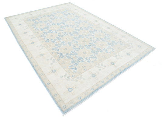 New Traditional Serenity hand-knotted wool rug (6 ft 8 in × 9 ft 5 in), featuring calming neutral tones and classic motifs, with plush texture and refined craftsmanship—available at Artemis Rugs in Carmel, California
