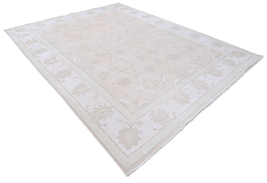 New Traditional Serenity hand-knotted wool rug (8 ft 8 in × 11 ft 2 in), showcasing a soft neutral palette with elegant traditional motifs, crafted for timeless appeal—available at Artemis Rugs in Carmel, California