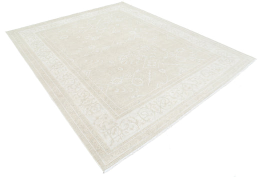 New Traditional Serenity hand-knotted wool rug (7 ft 11 in × 9 ft 8 in) featuring a soothing neutral palette with classic motifs and plush texture, expertly crafted—available at Artemis Rugs in Carmel, California.