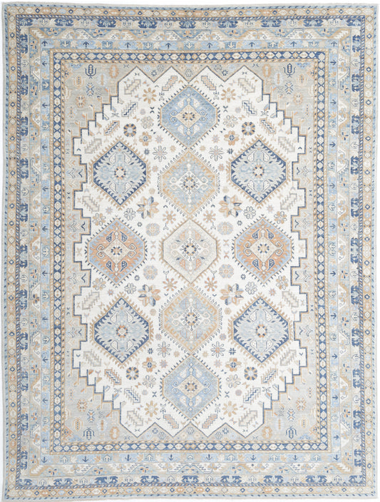 New Traditional Ziegler hand-knotted wool rug 9'0" x 12'1" (274 x 368 cm) in ivory, from Artemis Rugs in Carmel, CA. This authentic handmade Ziegler rug features elegant Persian-inspired floral and medallion patterns in soft ivory tones. Crafted with premium wool and expert hand-knotting techniques, offering exceptional durability, intricate detailing, and luxurious texture. Ideal for adding timeless sophistication and artisan quality to living rooms, bedrooms, or collectors of fine handmade wool rugs