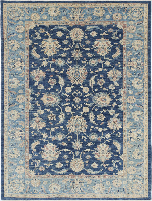 New Traditional Ziegler hand-knotted wool rug 5'9" x 8'0" (175 x 244 cm) in blue, from Artemis Rugs in Carmel, CA. Authentic handmade Ziegler rug showcasing classic Persian-inspired floral and vine motifs in rich blue tones. Expertly crafted from high-quality wool using traditional hand-knotting techniques for long-lasting durability, texture, and elegance. This medium-sized blue Ziegler rug offers timeless style and artisan craftsmanship—perfect for living rooms, bedrooms, or collectors of fine handmade
