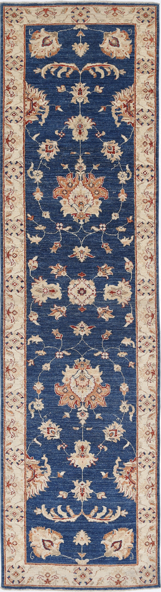 New Traditional Ziegler hand-knotted wool runner rug 2'6" x 10'0" (76 x 305 cm) in blue, from Artemis Rugs in Carmel, CA. Authentic handmade Ziegler runner showcasing classic traditional designs with rich blue tones. Crafted with premium, durable wool fibers using expert hand-knotting techniques. This blue Traditional Ziegler runner offers intricate patterns, soft texture, and genuine artisan craftsmanship, perfect for collectors and enthusiasts of timeless handmade wool rugs.