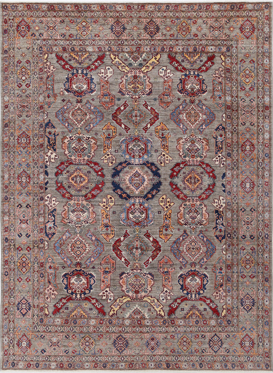 New Tribal Kazak hand-knotted wool rug 9'2" x 12'3" (279 x 373 cm) in grey, from Artemis Rugs in Carmel, CA. Authentic handmade Kazak wool rug featuring traditional tribal geometric patterns and classic Caucasian motifs. Crafted with premium, durable wool fibers using expert hand-knotting techniques. This grey Kazak rug offers rich texture and exquisite artisan craftsmanship, perfect for collectors and enthusiasts of authentic handmade tribal wool rugs