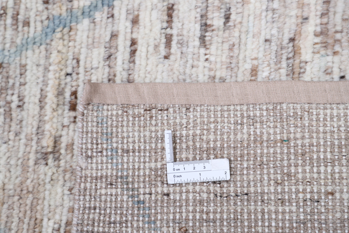 New Tribal Moroccan hand-knotted wool rug (6 ft 0 in × 8 ft 11 in) showcasing bold geometric tribal patterns in warm earthy tones, handcrafted with artisan skill—available at Artemis Rugs in Carmel, California