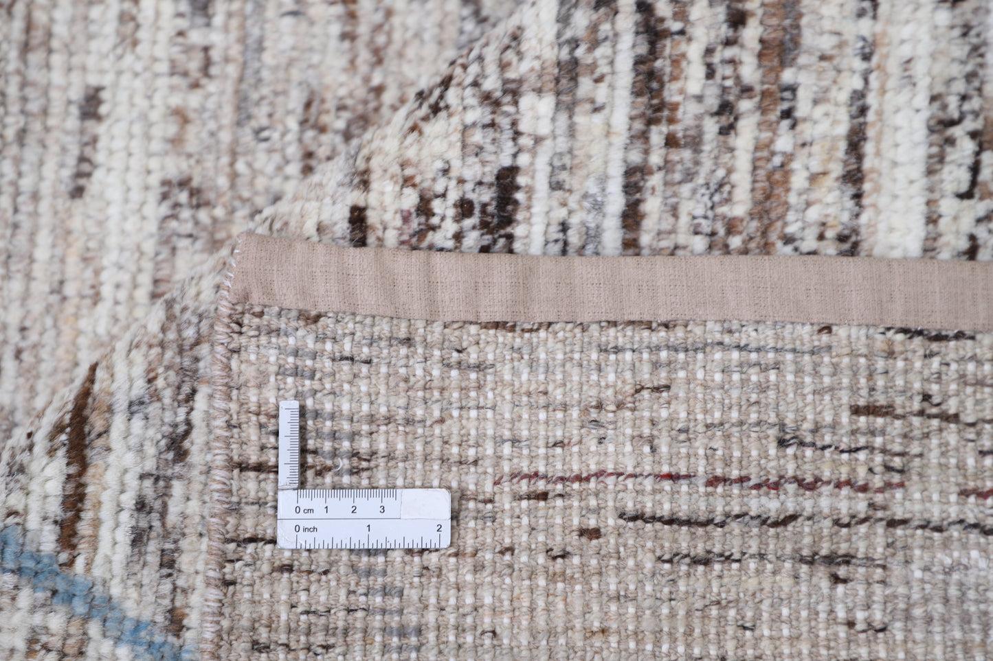 New Tribal Moroccan hand-knotted wool rug (6 ft 0 in × 9 ft 0 in) featuring bold geometric tribal patterns in rich earthy tones, crafted with artisan skill—available at Artemis Rugs in Carmel, California