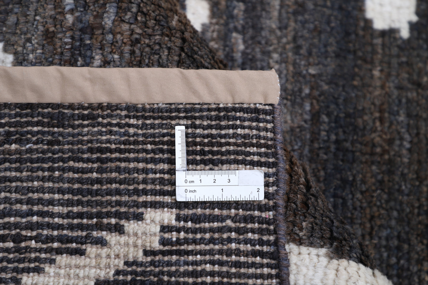 New Tribal Moroccan hand-knotted wool rug (8 ft 0 in × 9 ft 11 in) showcasing bold geometric tribal patterns in warm earthy tones, handcrafted with artisan skill—available at Artemis Rugs in Carmel, California