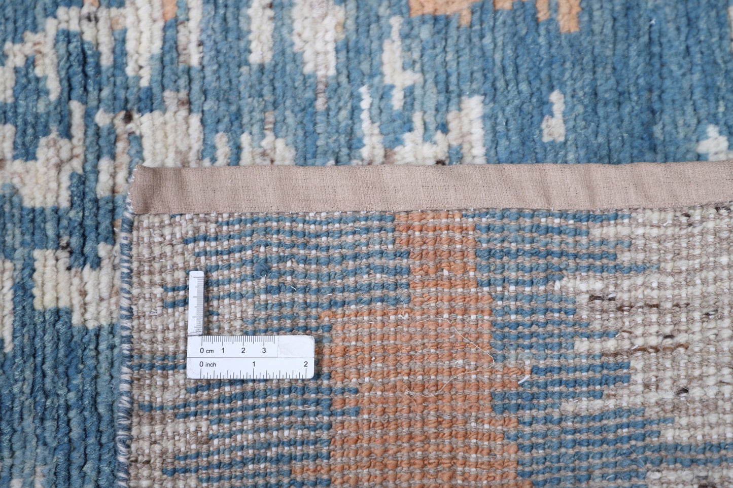 “New Tribal Moroccan hand-knotted wool runner rug (2 ft 6 in × 12 ft 1 in) featuring bold geometric tribal patterns in warm earthy tones, handcrafted with artisan skill—available at Artemis Rugs in Carmel, California