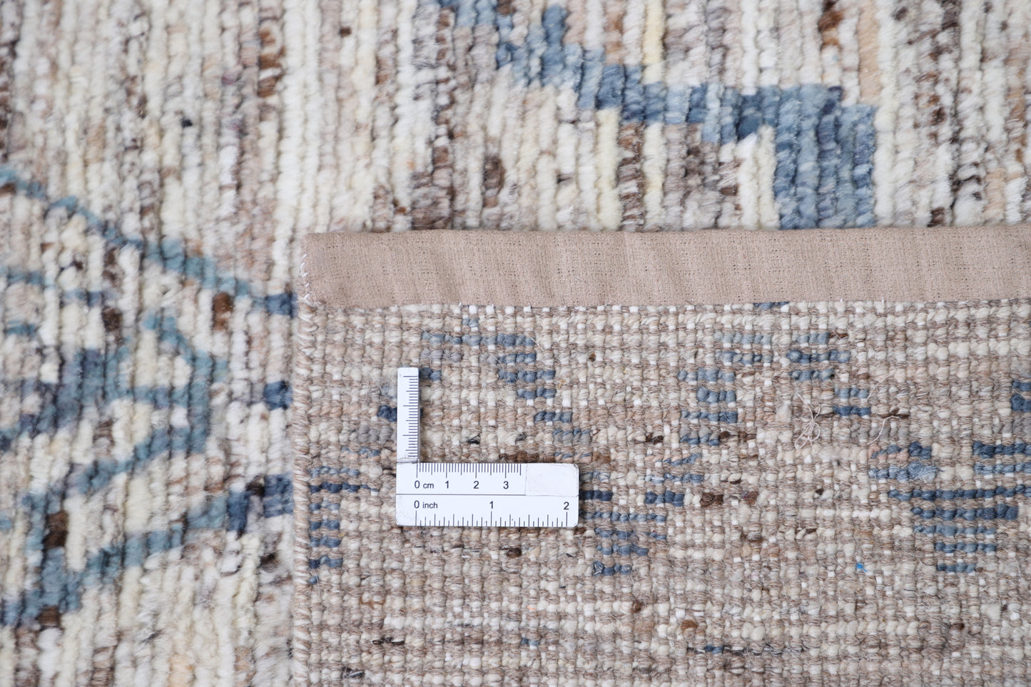 New Tribal Moroccan hand-knotted wool runner rug (3 ft 3 in × 11 ft 9 in) featuring bold geometric tribal patterns in warm earthy tones, handcrafted with artisan skill—available at Artemis Rugs in Carmel, California