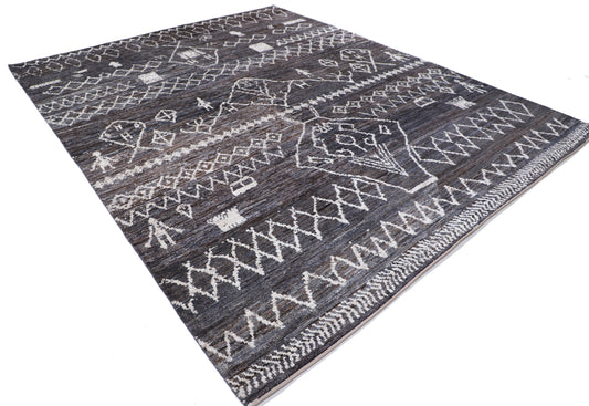 "New Tribal Moroccan hand-knotted wool rug 9'4" x 11'9" from Artemis Rugs in Carmel, CA. Authentic handmade wool rug featuring traditional Moroccan tribal patterns with intricate geometric and symbolic designs. Carefully hand-knotted by skilled artisans using premium, durable wool fibers for rich texture and lasting quality. This one-of-a-kind Moroccan rug reflects centuries-old craftsmanship and cultural heritage, perfect for collectors and admirers of fine, handcrafted tribal wool rugs