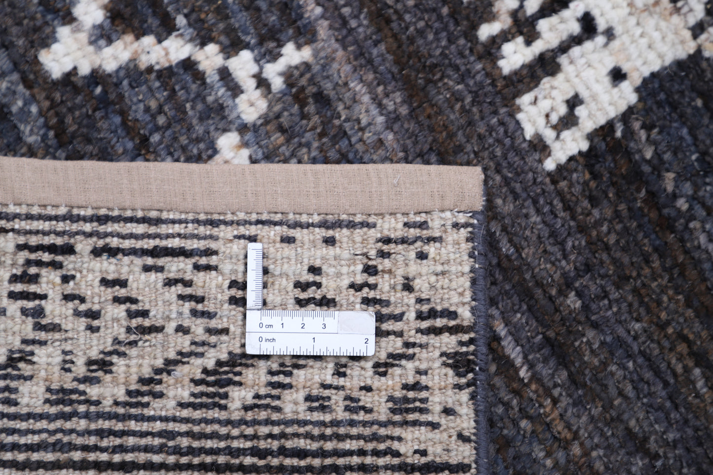 "New Tribal Moroccan hand-knotted wool rug 9'4" x 11'9" from Artemis Rugs in Carmel, CA. Authentic handmade wool rug featuring traditional Moroccan tribal patterns with intricate geometric and symbolic designs. Carefully hand-knotted by skilled artisans using premium, durable wool fibers for rich texture and lasting quality. This one-of-a-kind Moroccan rug reflects centuries-old craftsmanship and cultural heritage, perfect for collectors and admirers of fine, handcrafted tribal wool rugs"