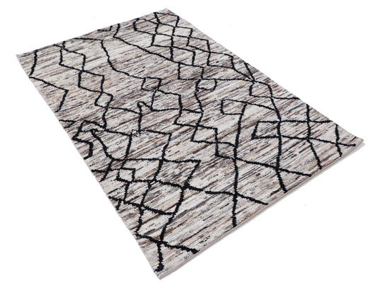 New Tribal Moroccan hand-knotted wool rug 4'0" x 5'10" from Artemis Rugs in Carmel, CA. Authentic handmade wool rug featuring bold tribal Moroccan patterns and traditional hand-knotting techniques. Crafted with high-quality, durable wool for a rich texture and lasting beauty. This artisan-made rug showcases intricate, geometric tribal designs rooted in Moroccan heritage, ideal for collectors and lovers of authentic, handcrafted wool rugs