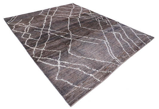 New Tribal Moroccan hand-knotted wool rug 8'1" x 9'10" from Artemis Rugs in Carmel, CA. Handcrafted using traditional Moroccan techniques, this authentic wool rug features bold tribal patterns and intricate geometric motifs. Made with high-quality, long-lasting wool fibers, it offers a richly textured surface and exceptional durability. A unique, artisan-made Moroccan rug that reflects genuine tribal design heritage—ideal for collectors and those seeking authentic, hand-knotted wool rugs with cultural sign