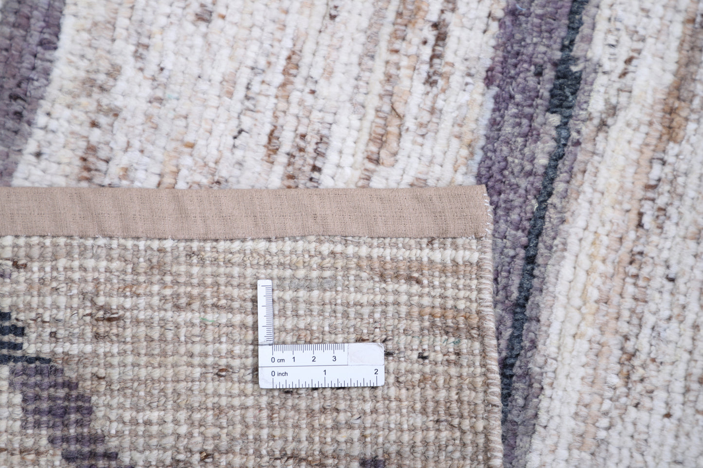 New Tribal Moroccan hand-knotted wool rug 9'1" x 12'4" from Artemis Rugs in Carmel, CA. Expertly handcrafted using traditional Moroccan techniques, this authentic wool rug features intricate tribal patterns and geometric motifs. Made from premium, durable wool fibers, offering a richly textured surface and long-lasting quality. A true example of Moroccan artisan craftsmanship, this large tribal rug is a one-of-a-kind piece that brings heritage, authenticity, and fine detail to any handmade rug collection.