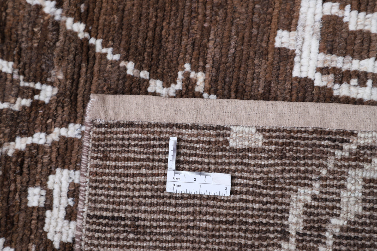 New Tribal Moroccan hand-knotted wool rug 8'11" x 11'11" from Artemis Rugs in Carmel, CA. Authentic handwoven wool rug featuring intricate tribal Moroccan patterns and traditional craftsmanship. Made with durable, high-quality wool fibers and expert hand-knotting techniques. Unique tribal design showcasing genuine Moroccan artisan skill, perfect for collectors and enthusiasts of handmade tribal rugs. Soft, long-lasting, and richly textured wool rug.