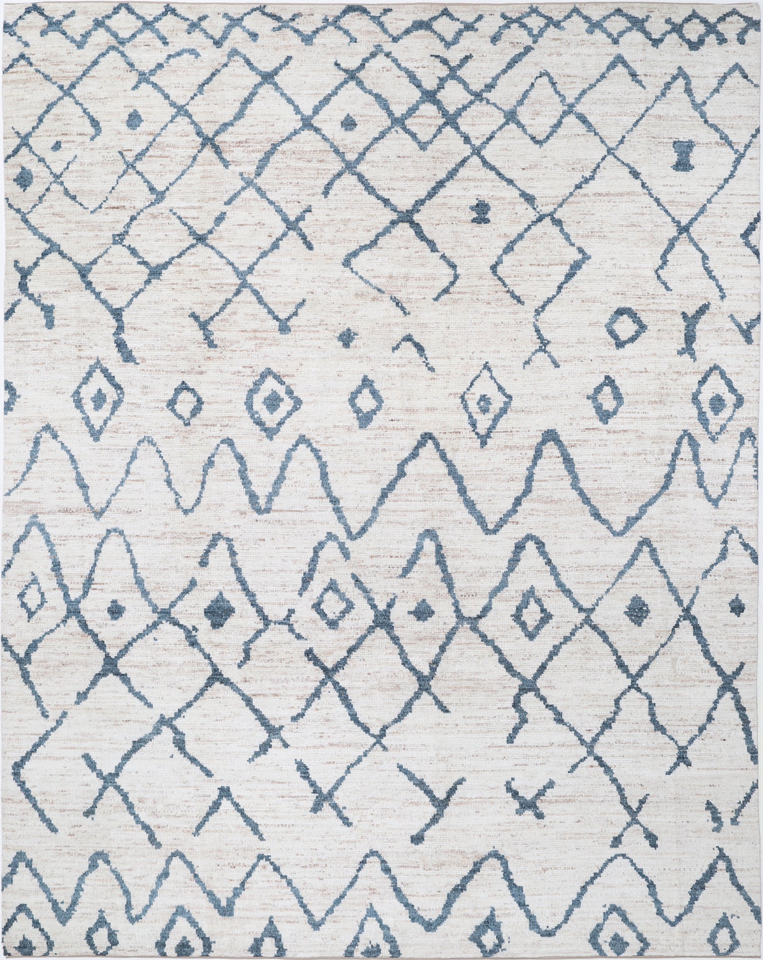 New Tribal Moroccan hand-knotted wool rug 9'3" x 11'9" (282 x 358 cm) in ivory, from Artemis Rugs in Carmel, CA. Authentic handmade wool rug featuring traditional Moroccan tribal patterns with elegant geometric designs. Crafted from high-quality, durable wool fibers using expert hand-knotting techniques. This ivory-toned tribal rug offers rich texture and genuine artisan craftsmanship, ideal for collectors and enthusiasts of authentic Moroccan wool rugs